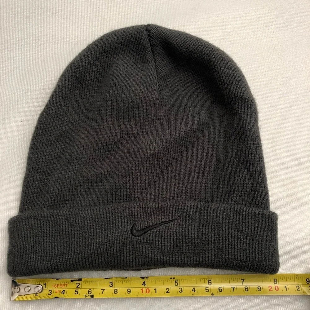 Nike dark gray beanie hat with black swoosh